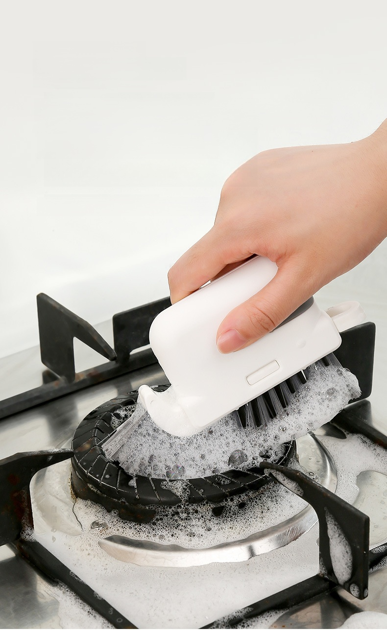 家庭用入り江ブラシで窓のデッドコーナー掃除