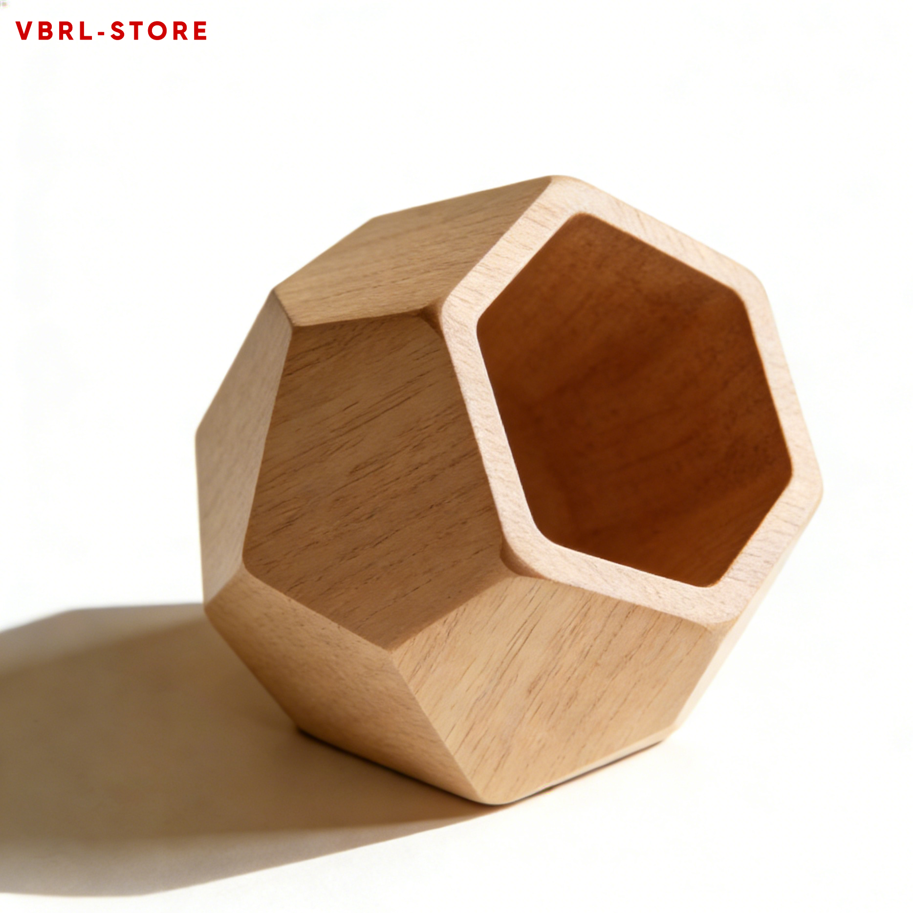 Close-up of geometric-cut oak pen holder