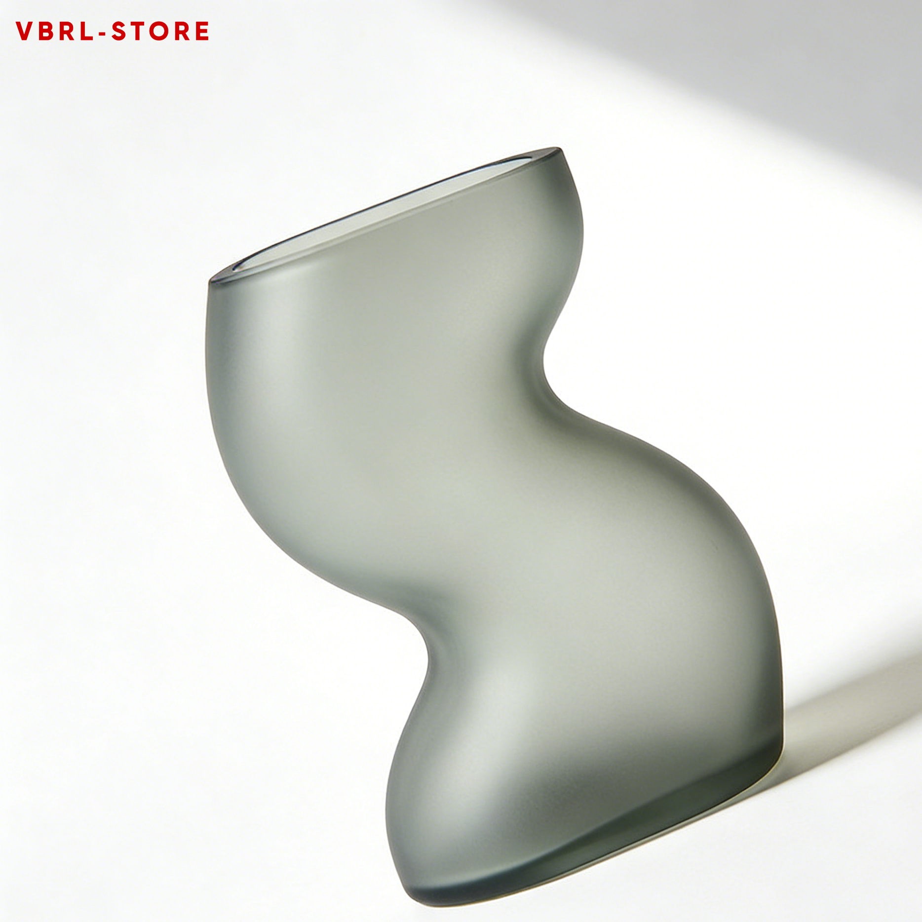 Set of three gray-toned mosaic glass vases