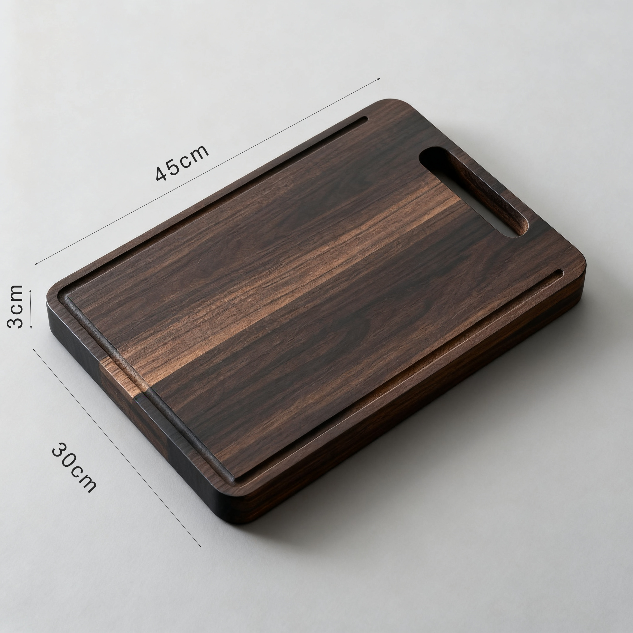 Schickes Schneidebrett aus Schwarz-Nussbaumholz auf K&uuml;chentisch