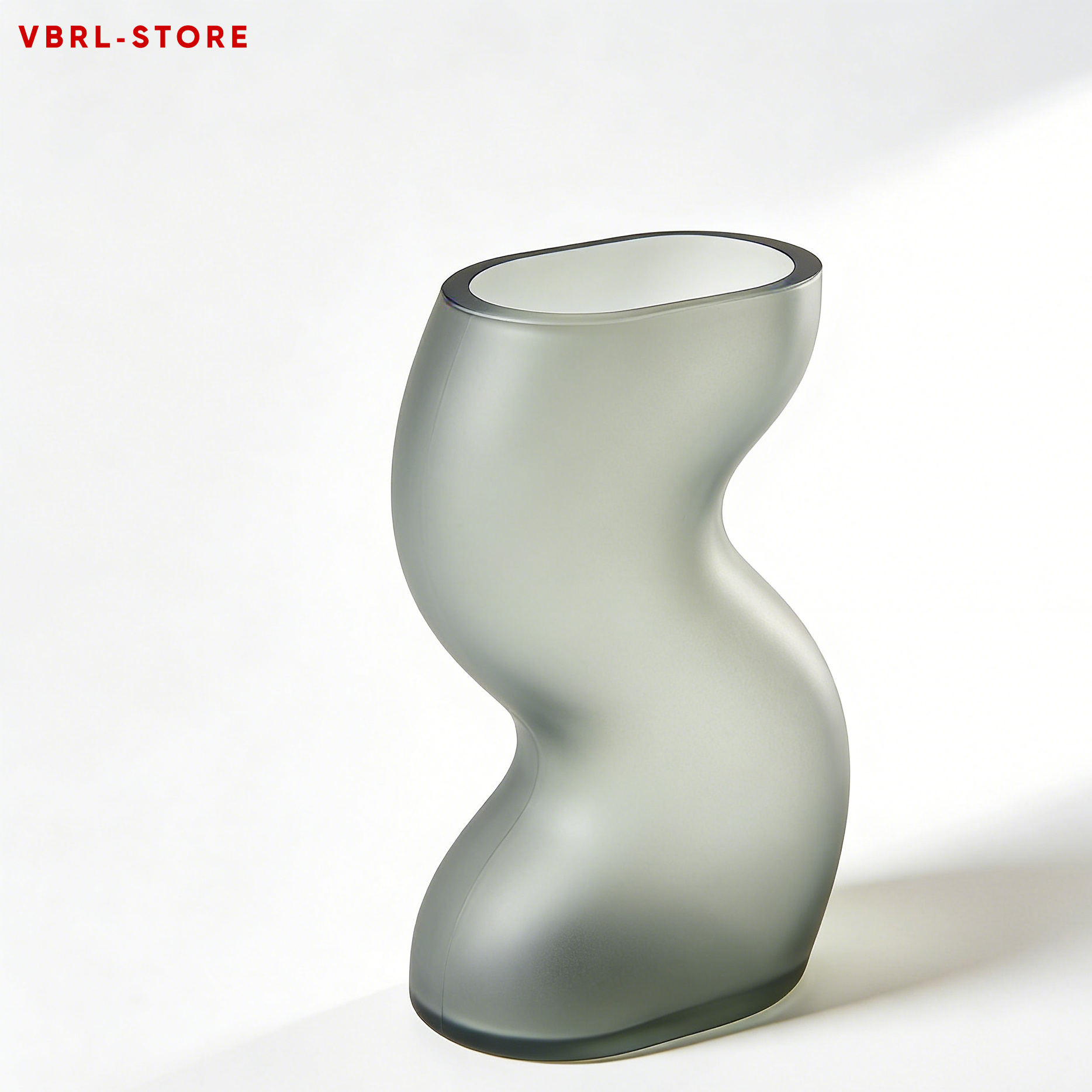 Close-up of mosaic glass vase with gray accents