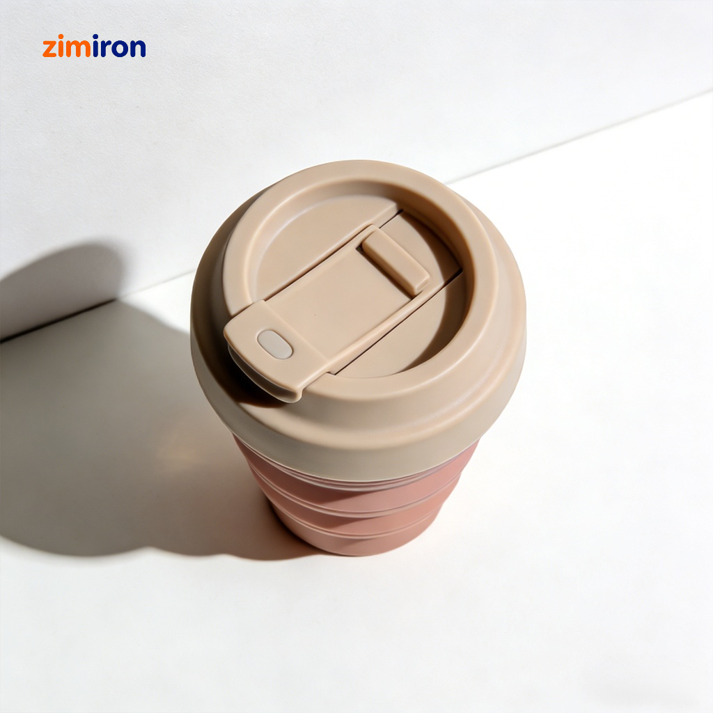 Foldable silicone water cup in collapsed form